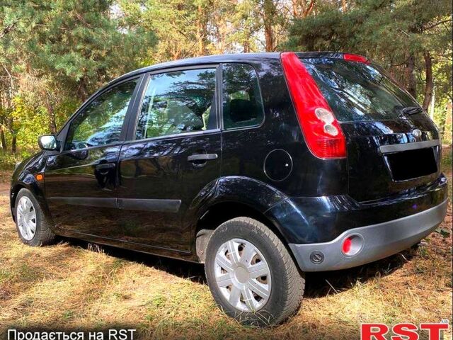 Черный Форд Фиеста, объемом двигателя 1.4 л и пробегом 200 тыс. км за 3800 $, фото 2 на Automoto.ua