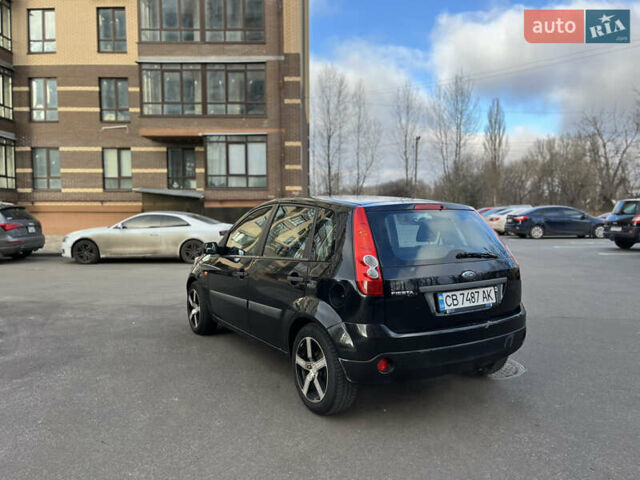 Черный Форд Фиеста, объемом двигателя 1.4 л и пробегом 210 тыс. км за 4200 $, фото 6 на Automoto.ua