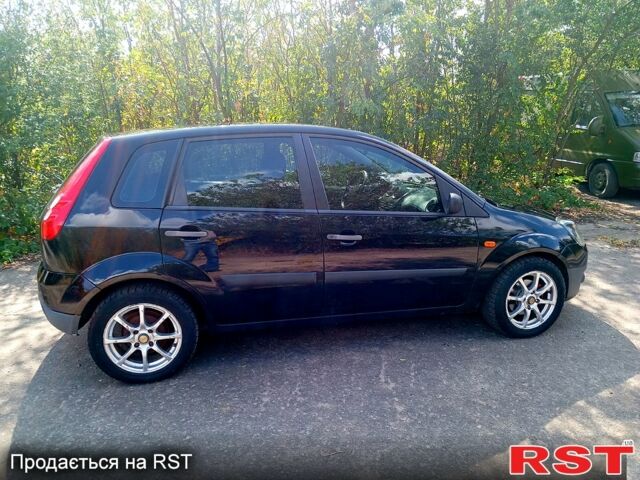 Чорний Форд Фієста, об'ємом двигуна 1.4 л та пробігом 154 тис. км за 5100 $, фото 2 на Automoto.ua