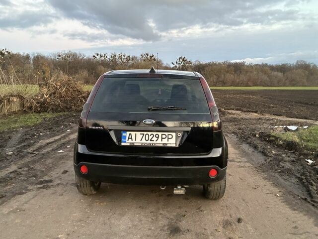 Черный Форд Фиеста, объемом двигателя 1.4 л и пробегом 250 тыс. км за 4000 $, фото 4 на Automoto.ua