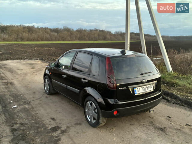 Черный Форд Фиеста, объемом двигателя 1.4 л и пробегом 270 тыс. км за 3250 $, фото 5 на Automoto.ua