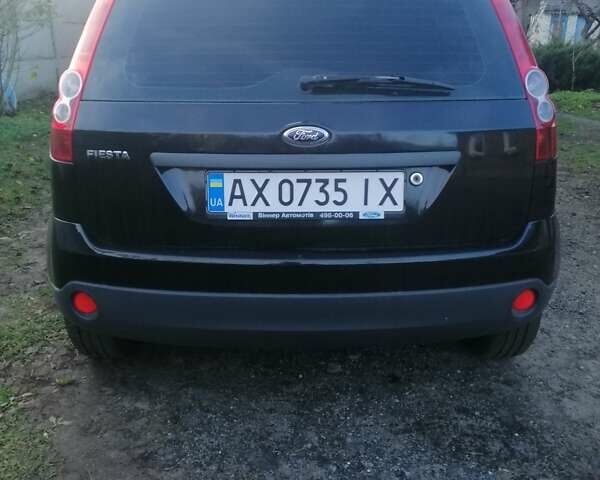 Черный Форд Фиеста, объемом двигателя 1.4 л и пробегом 204 тыс. км за 3900 $, фото 1 на Automoto.ua