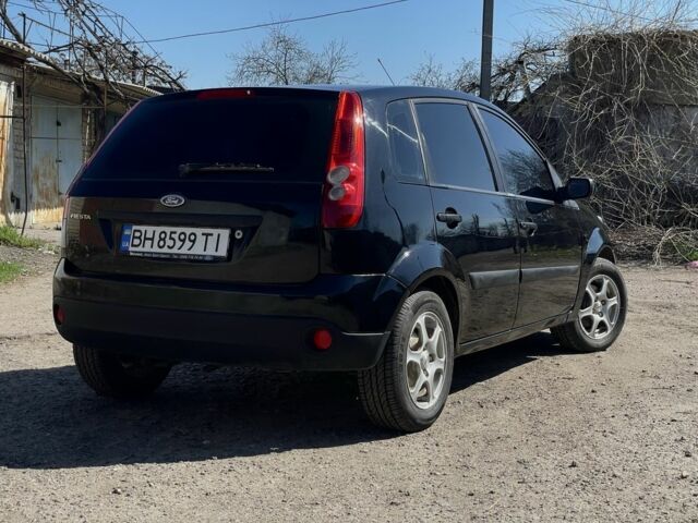 Черный Форд Фиеста, объемом двигателя 1.4 л и пробегом 210 тыс. км за 3300 $, фото 5 на Automoto.ua