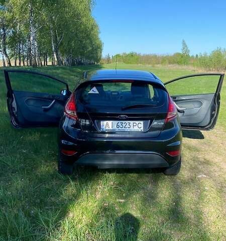 Черный Форд Фиеста, объемом двигателя 1.4 л и пробегом 149 тыс. км за 5700 $, фото 3 на Automoto.ua