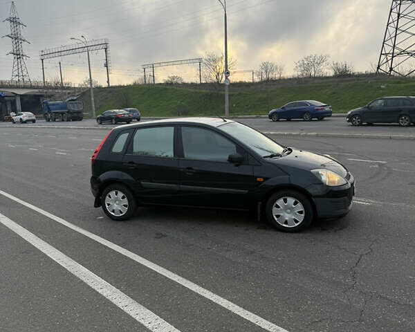 Черный Форд Фиеста, объемом двигателя 1.25 л и пробегом 116 тыс. км за 3800 $, фото 2 на Automoto.ua