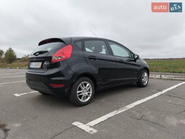 Черный Форд Фиеста, объемом двигателя 1.4 л и пробегом 170 тыс. км за 5990 $, фото 4 на Automoto.ua