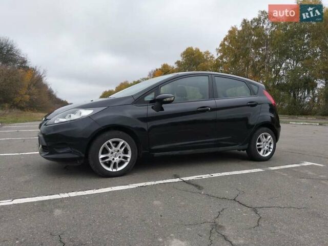 Черный Форд Фиеста, объемом двигателя 1.4 л и пробегом 170 тыс. км за 5990 $, фото 11 на Automoto.ua