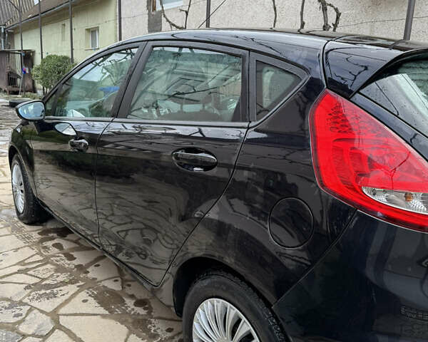 Черный Форд Фиеста, объемом двигателя 1.6 л и пробегом 229 тыс. км за 6400 $, фото 6 на Automoto.ua