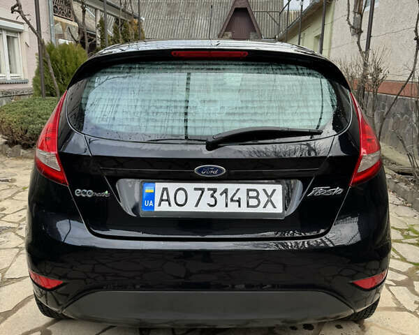 Черный Форд Фиеста, объемом двигателя 1.6 л и пробегом 229 тыс. км за 6400 $, фото 5 на Automoto.ua