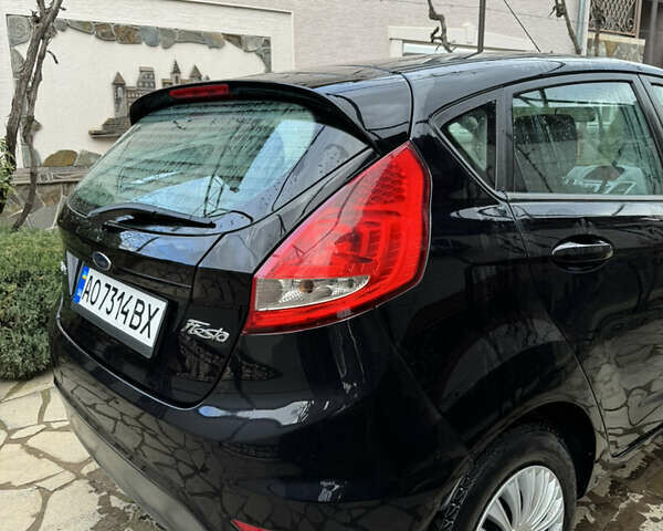 Черный Форд Фиеста, объемом двигателя 1.6 л и пробегом 229 тыс. км за 6400 $, фото 4 на Automoto.ua