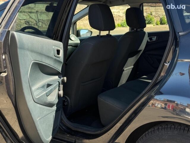 Чорний Форд Фієста, об'ємом двигуна 1.4 л та пробігом 183 тис. км за 7240 $, фото 30 на Automoto.ua