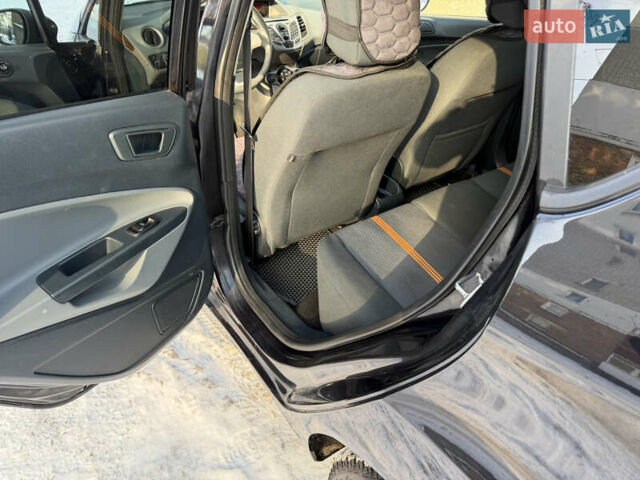 Чорний Форд Фієста, об'ємом двигуна 1.25 л та пробігом 206 тис. км за 6250 $, фото 27 на Automoto.ua