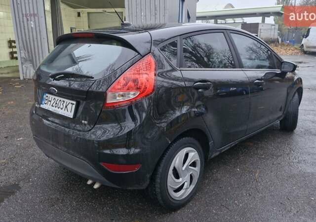 Чорний Форд Фієста, об'ємом двигуна 1.6 л та пробігом 170 тис. км за 5750 $, фото 5 на Automoto.ua