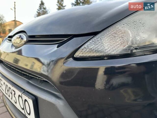 Черный Форд Фиеста, объемом двигателя 1.6 л и пробегом 210 тыс. км за 5000 $, фото 21 на Automoto.ua