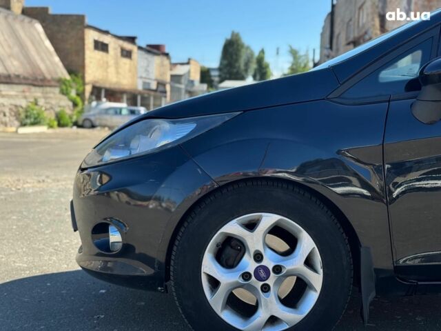 Чорний Форд Фієста, об'ємом двигуна 1.4 л та пробігом 183 тис. км за 7240 $, фото 3 на Automoto.ua