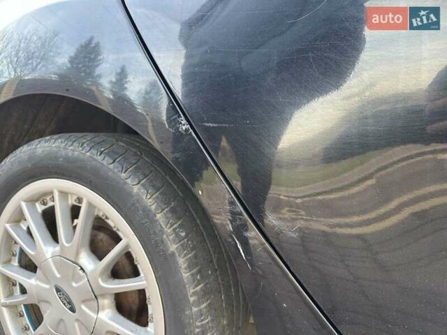 Черный Форд Фиеста, объемом двигателя 1.6 л и пробегом 210 тыс. км за 5000 $, фото 20 на Automoto.ua