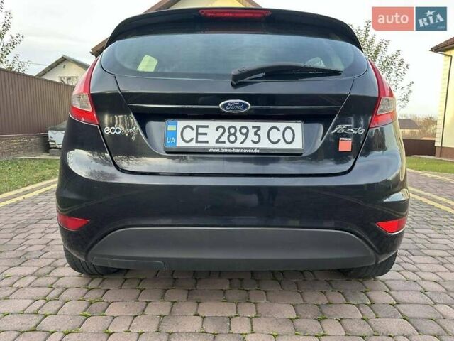 Черный Форд Фиеста, объемом двигателя 1.6 л и пробегом 210 тыс. км за 5000 $, фото 4 на Automoto.ua