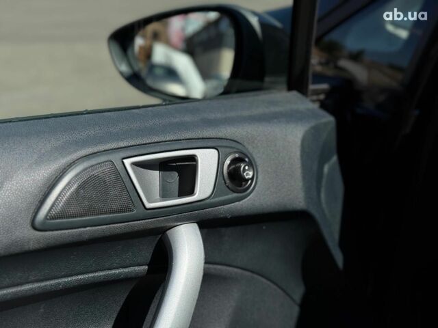 Чорний Форд Фієста, об'ємом двигуна 1.4 л та пробігом 183 тис. км за 7240 $, фото 18 на Automoto.ua