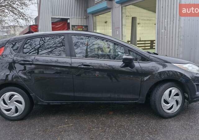 Чорний Форд Фієста, об'ємом двигуна 1.6 л та пробігом 170 тис. км за 5750 $, фото 7 на Automoto.ua