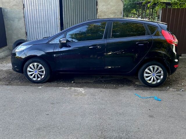 Черный Форд Фиеста, объемом двигателя 1.4 л и пробегом 280 тыс. км за 5800 $, фото 1 на Automoto.ua