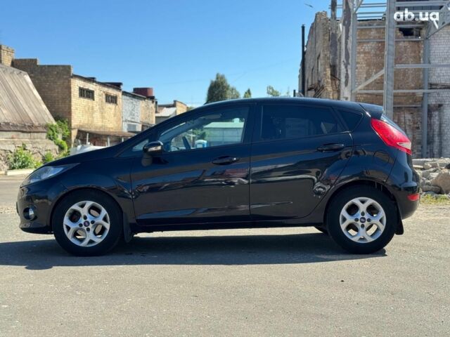 Чорний Форд Фієста, об'ємом двигуна 1.4 л та пробігом 183 тис. км за 7240 $, фото 4 на Automoto.ua