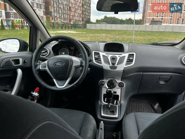 Чорний Форд Фієста, об'ємом двигуна 1.4 л та пробігом 182 тис. км за 6000 $, фото 4 на Automoto.ua