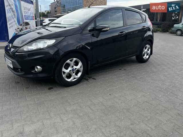 Чорний Форд Фієста, об'ємом двигуна 1.4 л та пробігом 182 тис. км за 6000 $, фото 1 на Automoto.ua