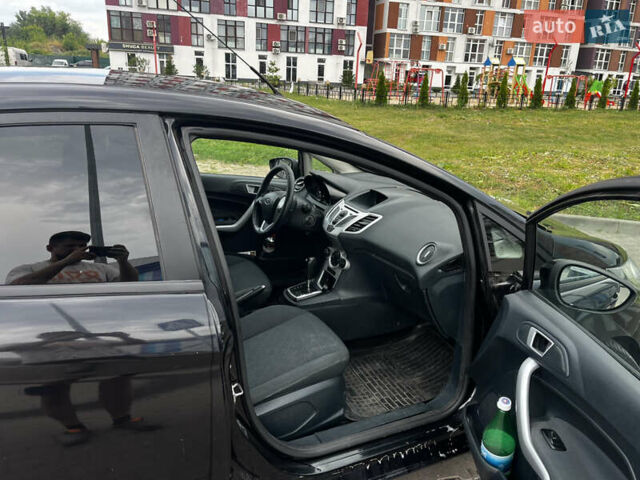 Чорний Форд Фієста, об'ємом двигуна 1.4 л та пробігом 182 тис. км за 6000 $, фото 5 на Automoto.ua