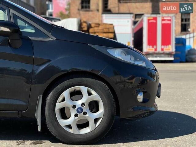 Черный Форд Фиеста, объемом двигателя 1.4 л и пробегом 183 тыс. км за 7240 $, фото 12 на Automoto.ua
