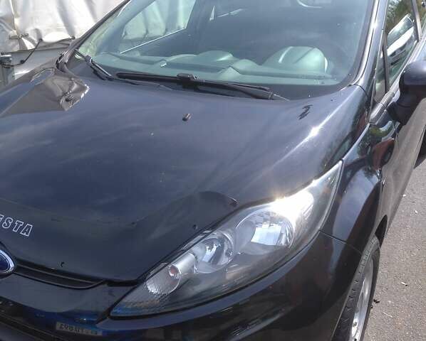 Черный Форд Фиеста, объемом двигателя 1.4 л и пробегом 171 тыс. км за 6000 $, фото 2 на Automoto.ua