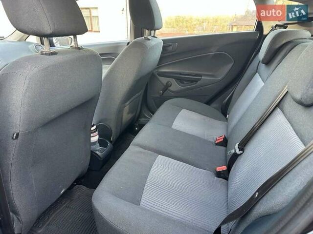 Черный Форд Фиеста, объемом двигателя 1.6 л и пробегом 210 тыс. км за 5000 $, фото 13 на Automoto.ua