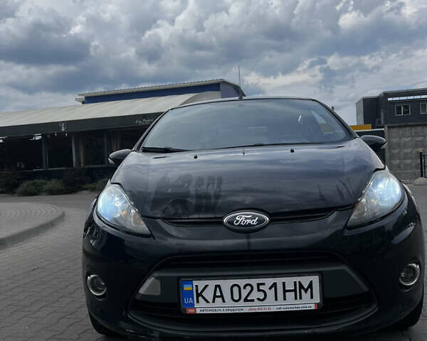 Чорний Форд Фієста, об'ємом двигуна 1.4 л та пробігом 182 тис. км за 6000 $, фото 2 на Automoto.ua