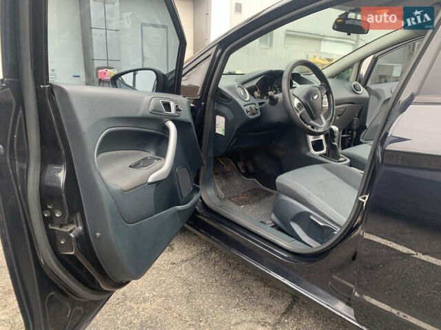 Черный Форд Фиеста, объемом двигателя 1.56 л и пробегом 322 тыс. км за 6200 $, фото 9 на Automoto.ua
