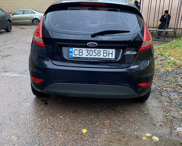 Черный Форд Фиеста, объемом двигателя 1.25 л и пробегом 180 тыс. км за 6700 $, фото 2 на Automoto.ua