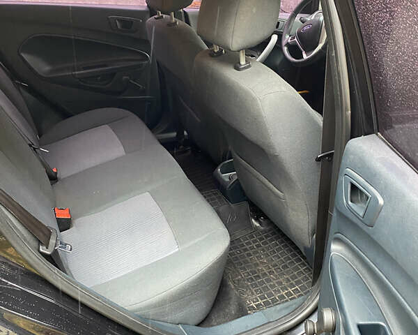 Черный Форд Фиеста, объемом двигателя 1.25 л и пробегом 180 тыс. км за 6700 $, фото 6 на Automoto.ua