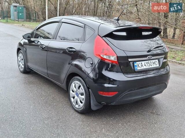 Чорний Форд Фієста, об'ємом двигуна 1.4 л та пробігом 203 тис. км за 7000 $, фото 5 на Automoto.ua