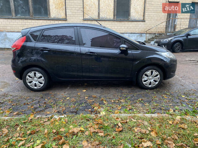 Черный Форд Фиеста, объемом двигателя 1.25 л и пробегом 180 тыс. км за 6700 $, фото 3 на Automoto.ua