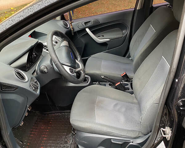 Черный Форд Фиеста, объемом двигателя 1.25 л и пробегом 180 тыс. км за 6700 $, фото 8 на Automoto.ua