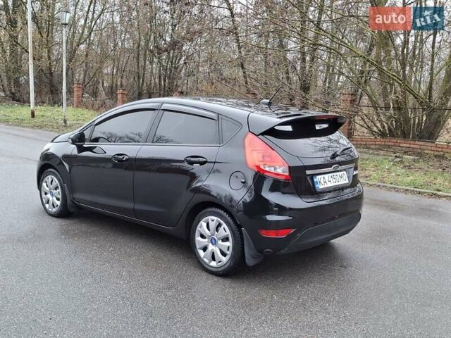 Чорний Форд Фієста, об'ємом двигуна 1.4 л та пробігом 203 тис. км за 7000 $, фото 4 на Automoto.ua