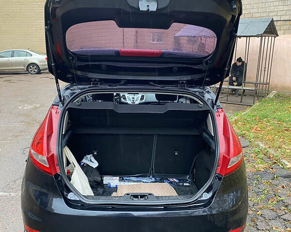 Черный Форд Фиеста, объемом двигателя 1.25 л и пробегом 180 тыс. км за 6700 $, фото 4 на Automoto.ua