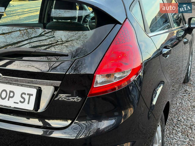 Чорний Форд Фієста, об'ємом двигуна 1.56 л та пробігом 280 тис. км за 5900 $, фото 10 на Automoto.ua