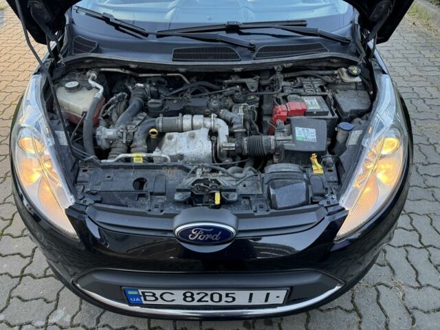 Чорний Форд Фієста, об'ємом двигуна 1.6 л та пробігом 264 тис. км за 7200 $, фото 6 на Automoto.ua