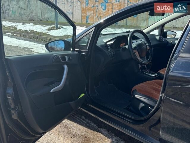 Черный Форд Фиеста, объемом двигателя 1.39 л и пробегом 265 тыс. км за 5300 $, фото 10 на Automoto.ua