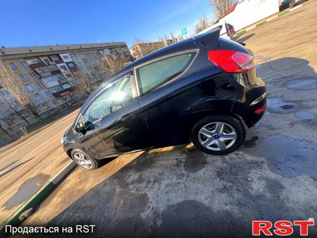 Черный Форд Фиеста, объемом двигателя 1.5 л и пробегом 230 тыс. км за 5700 $, фото 4 на Automoto.ua