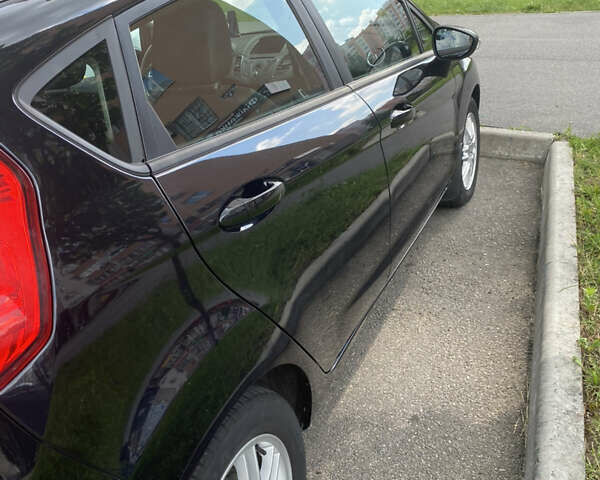 Черный Форд Фиеста, объемом двигателя 1 л и пробегом 79 тыс. км за 6799 $, фото 2 на Automoto.ua