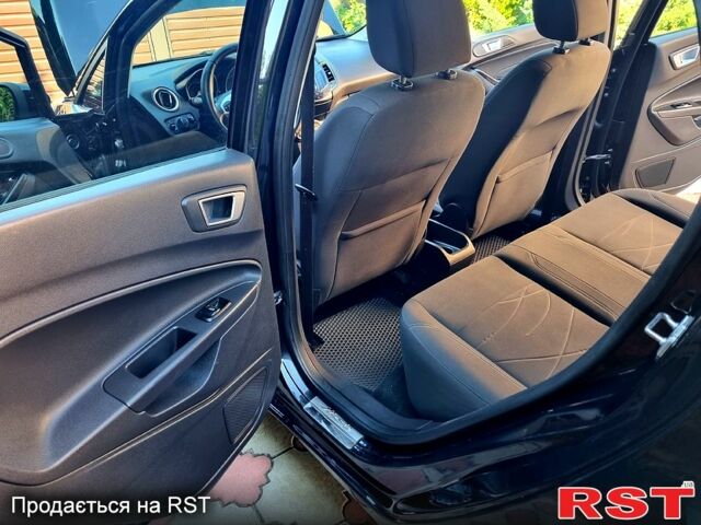 Черный Форд Фиеста, объемом двигателя 1 л и пробегом 146 тыс. км за 5500 $, фото 6 на Automoto.ua