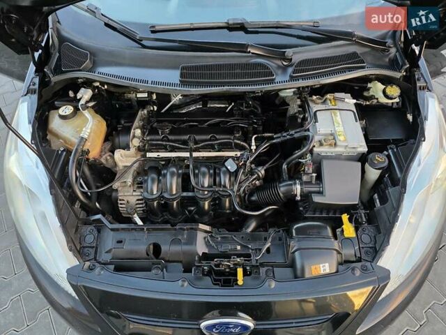 Черный Форд Фиеста, объемом двигателя 1.6 л и пробегом 213 тыс. км за 7333 $, фото 22 на Automoto.ua