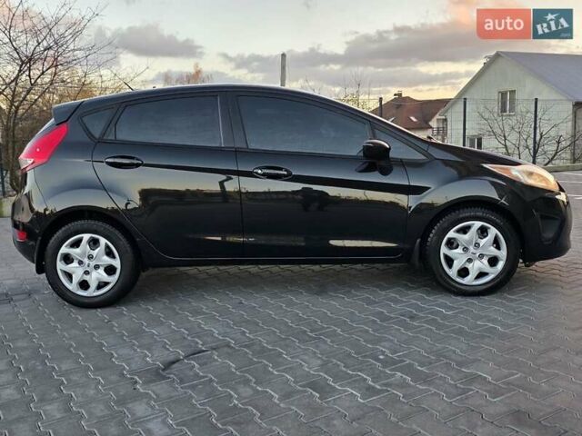 Черный Форд Фиеста, объемом двигателя 1.6 л и пробегом 213 тыс. км за 7333 $, фото 13 на Automoto.ua