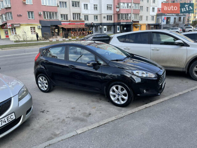 Черный Форд Фиеста, объемом двигателя 1 л и пробегом 79 тыс. км за 6799 $, фото 4 на Automoto.ua
