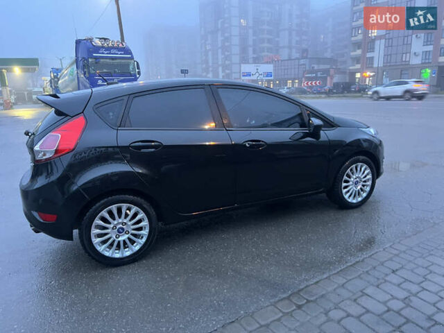 Черный Форд Фиеста, объемом двигателя 1.6 л и пробегом 204 тыс. км за 7350 $, фото 6 на Automoto.ua